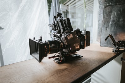 On the surface of the wooden black camera
